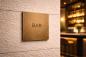 Preview: Premium Türschild aus brüniertem Messing für klare Beschilderung in Hotel und Gastro