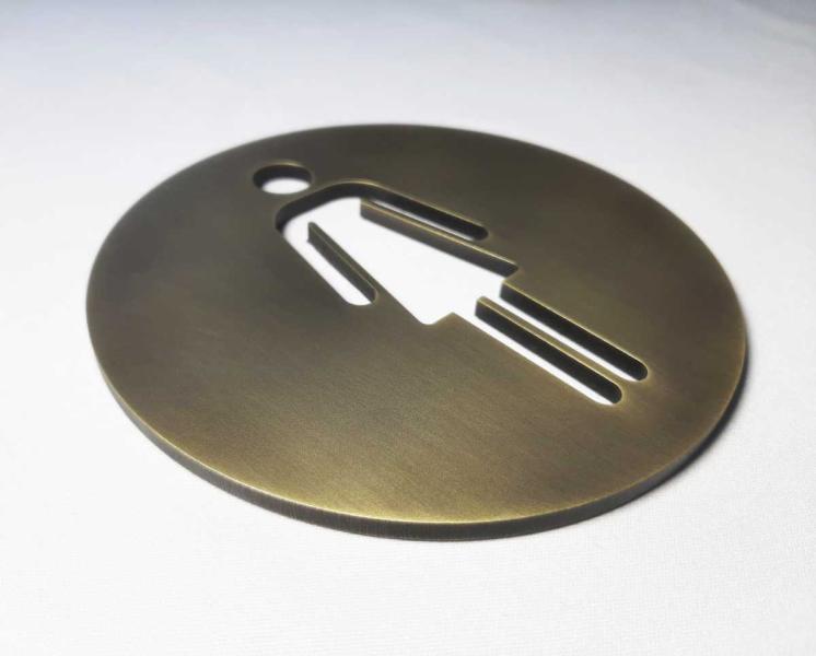 Piktogramm Dame Messing